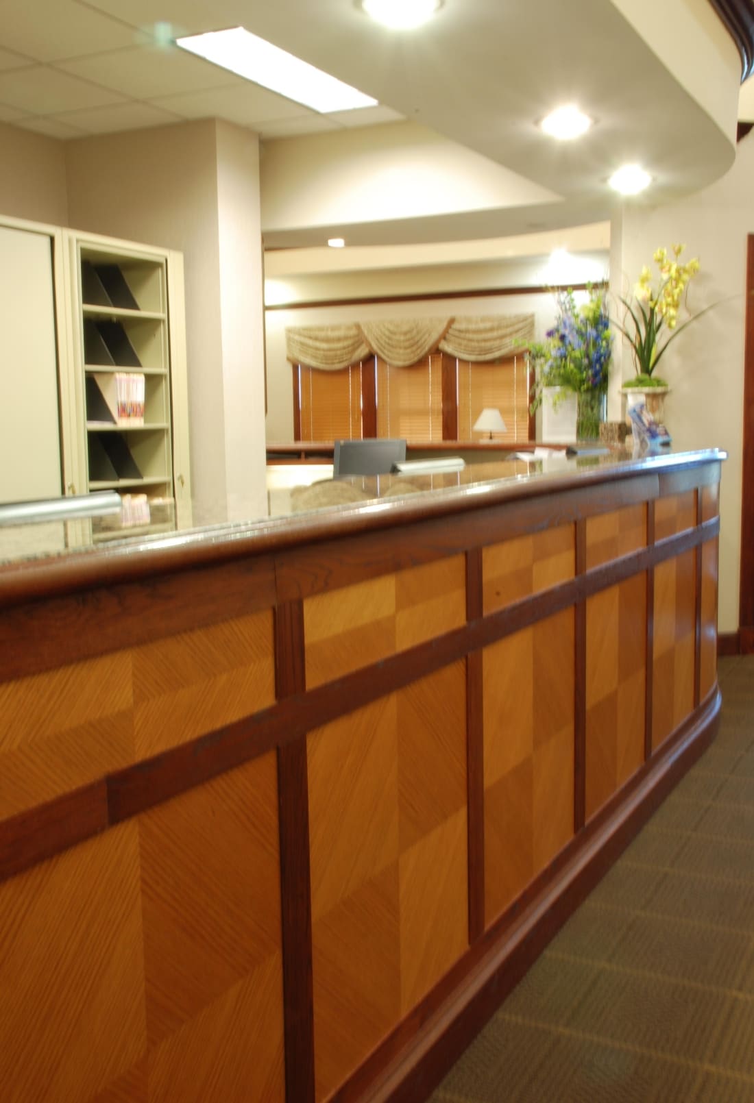 Front desk with fresh flowers